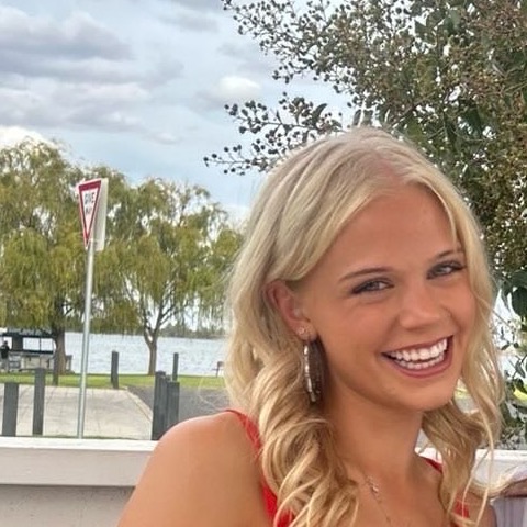 Charlize smiling warmly